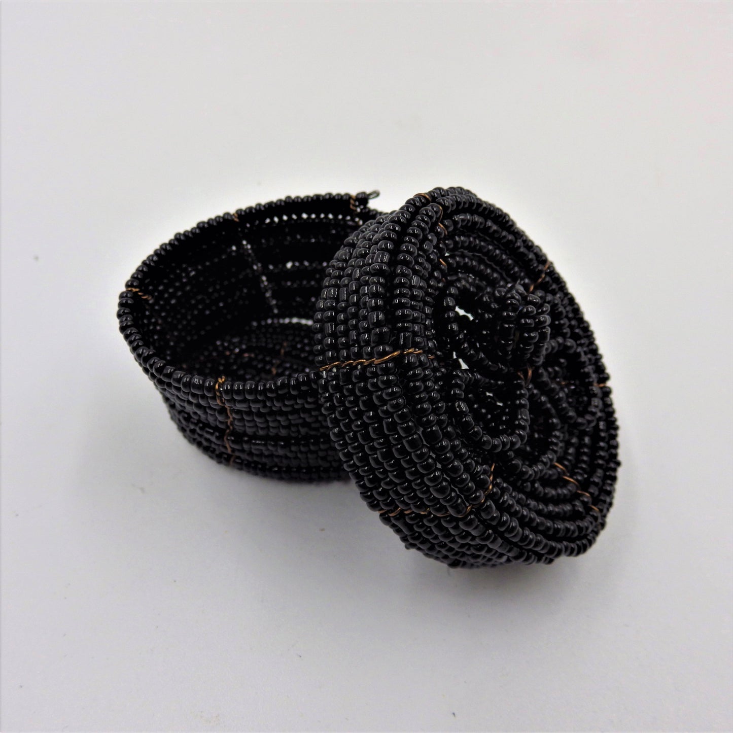 Oval Beaded Boxes.