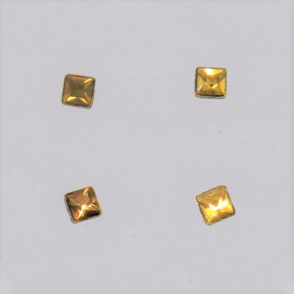 Silver nose-pins coloured