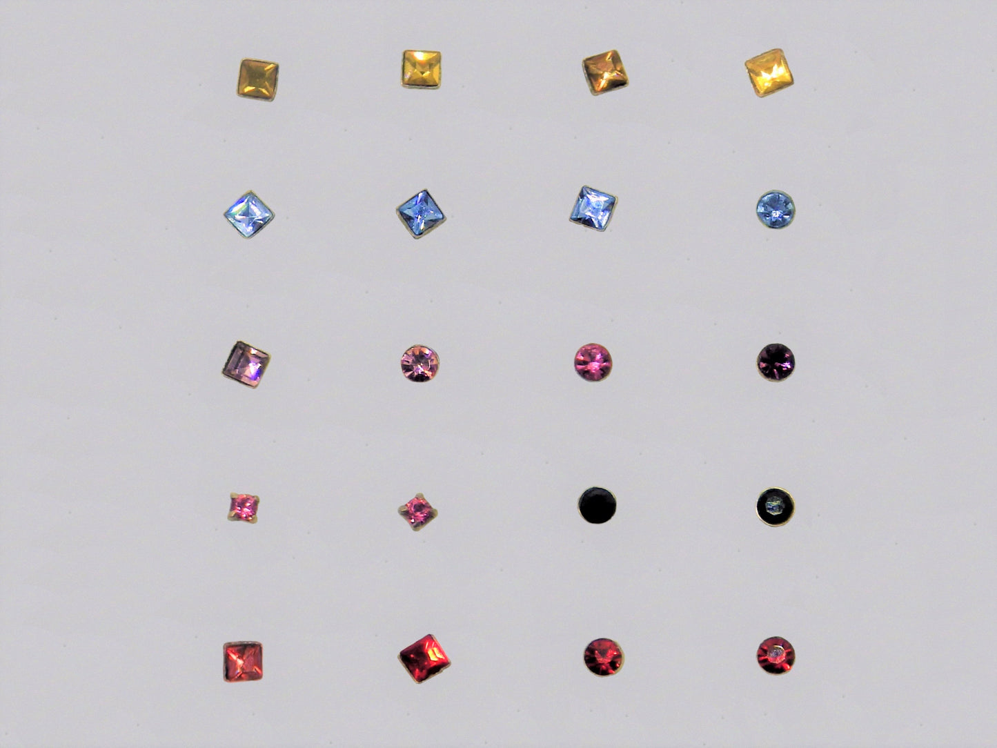 Silver nose-pins coloured